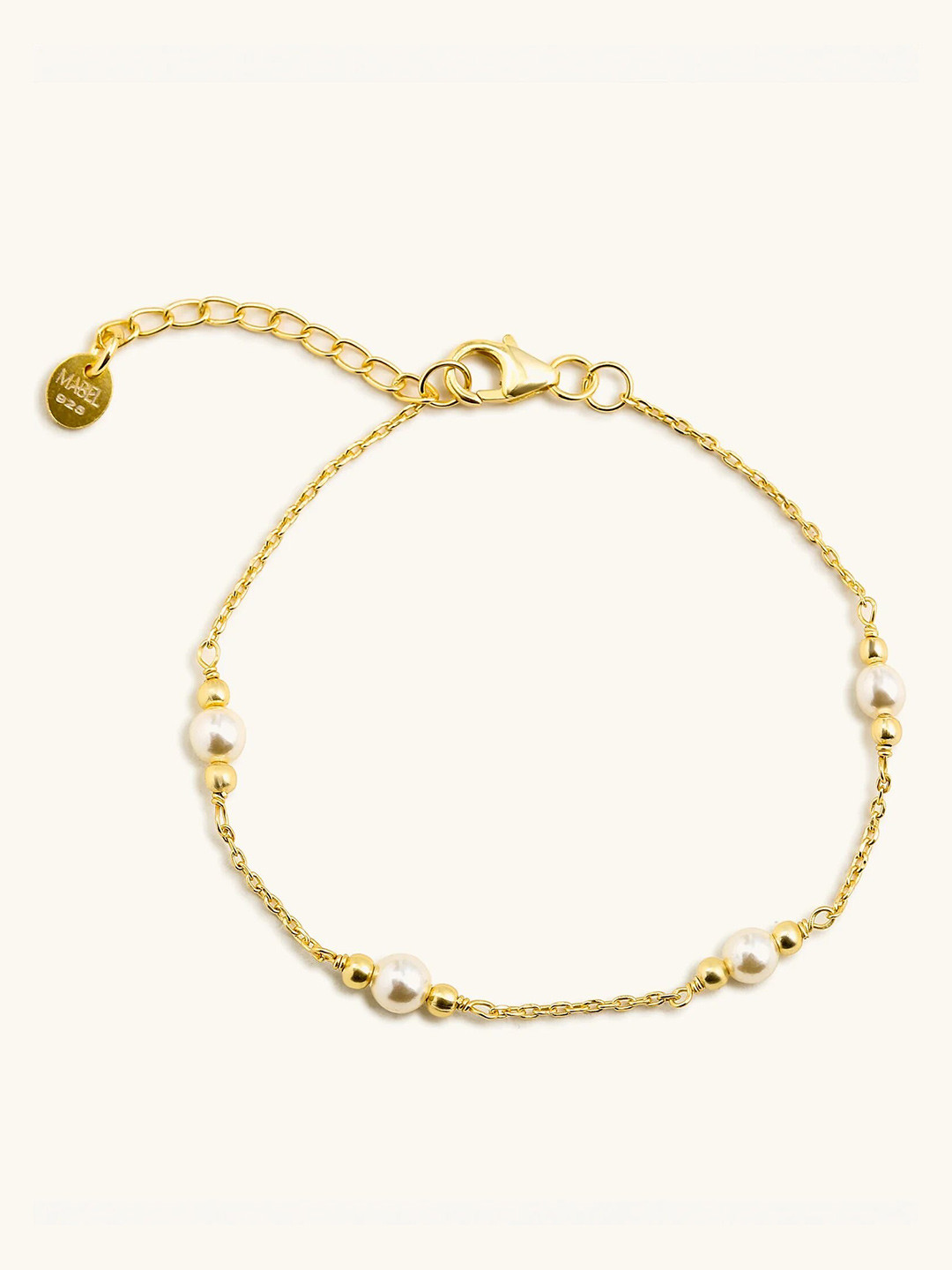 

Mabel 925 Sterling Silver 18 Karat Gold Plated Pearl String bracelet