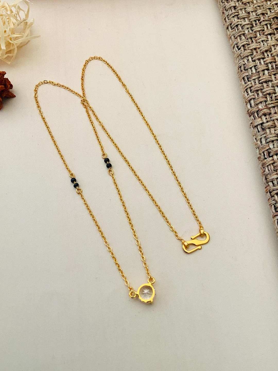 

ABDESIGNS Gold-Plated Artificial Stones and Beads Mangalsutra