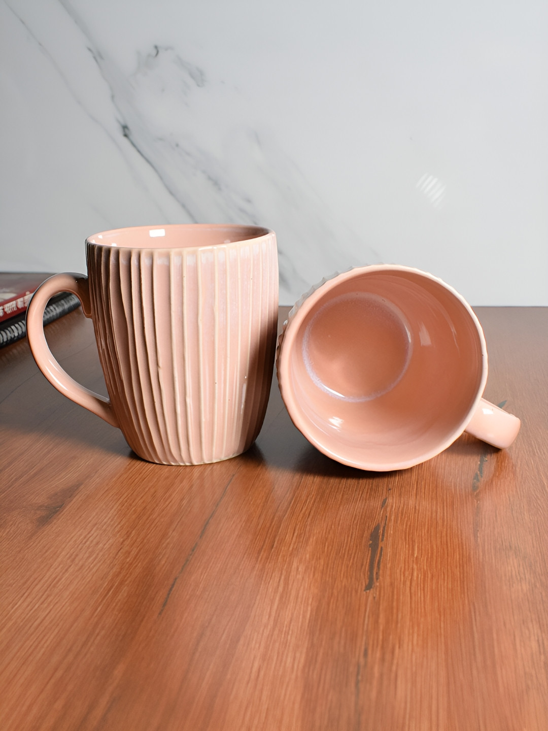 

The Decor Lane Pink 2 Pieces Textured Ceramic Glossy Mugs 320 ml