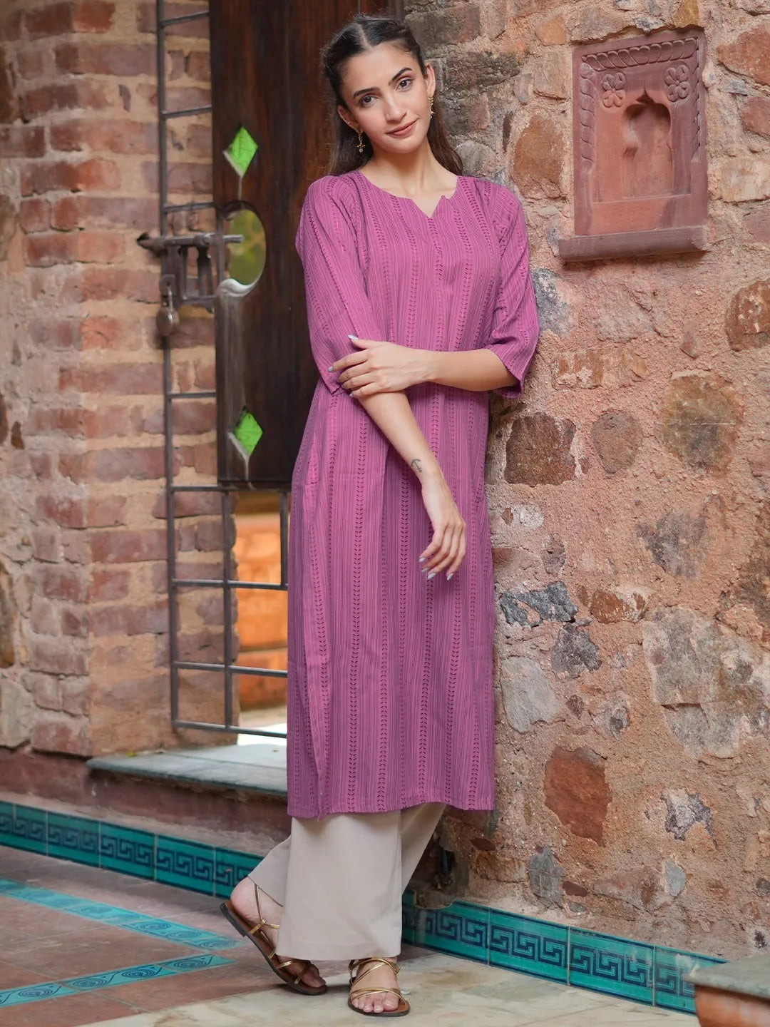 

Libas Women Striped Keyhole Neck Flared Sleeves Jacquard Kurta, Mauve