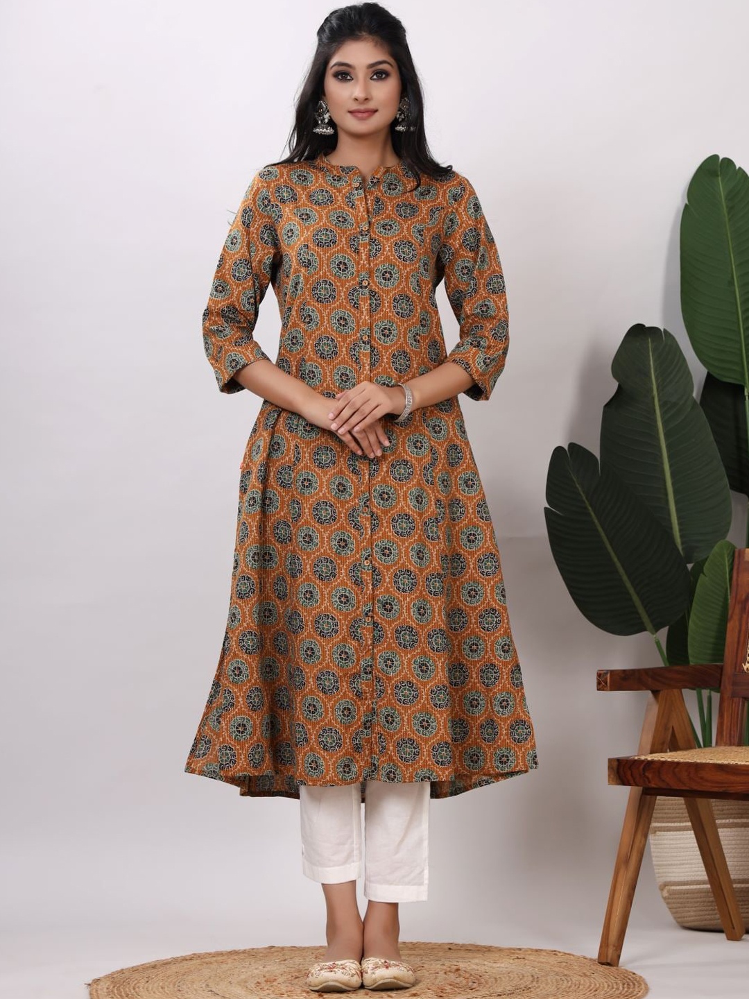 

VASVI Kantha Work Ethnic Motifs Printed Cotton A-Line Kurta, Mustard