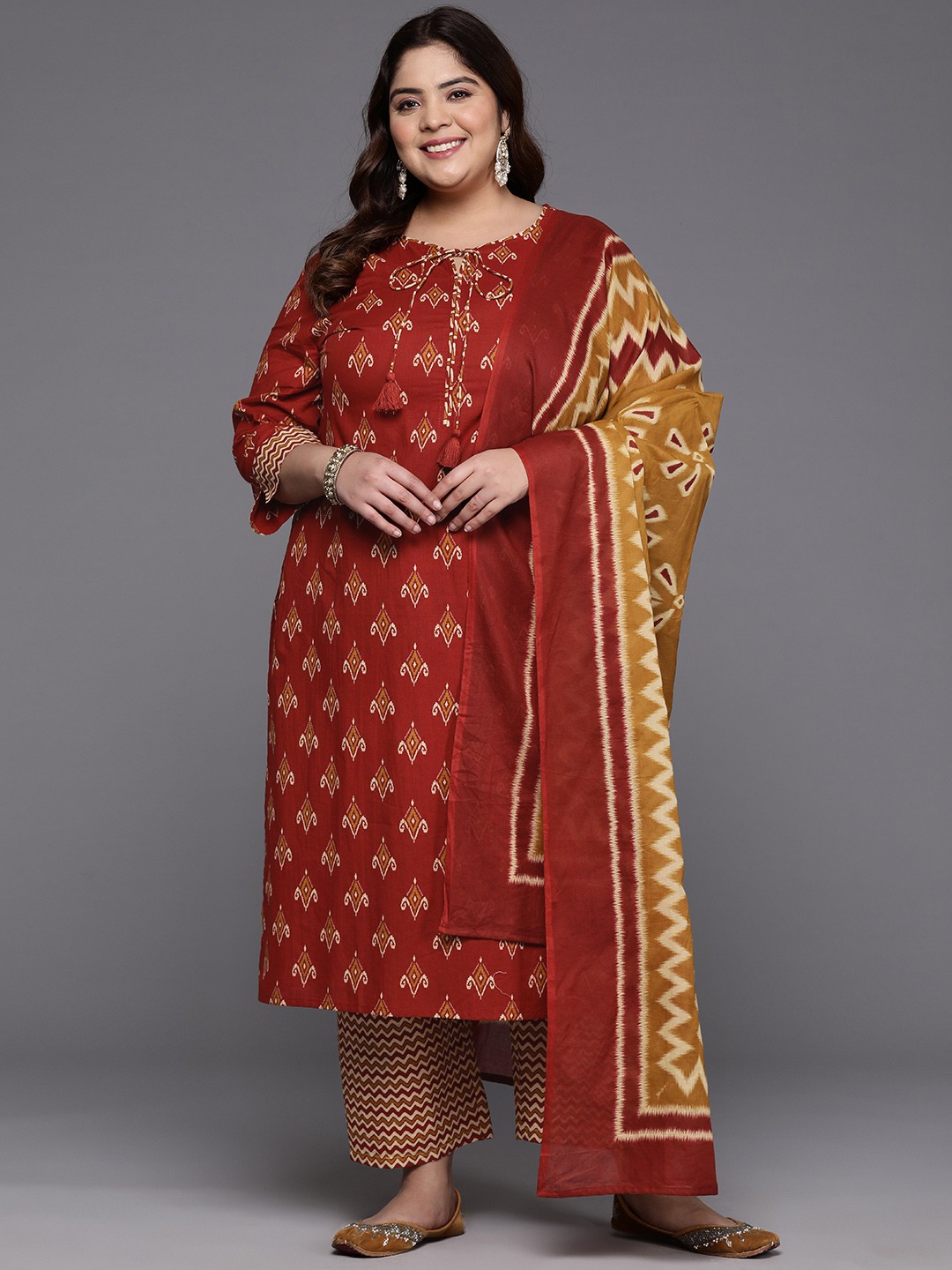

Indo Era Women Plus Size Ethnic Motifs Printed Cotton Kurta with Trousers & Dupatta, Maroon