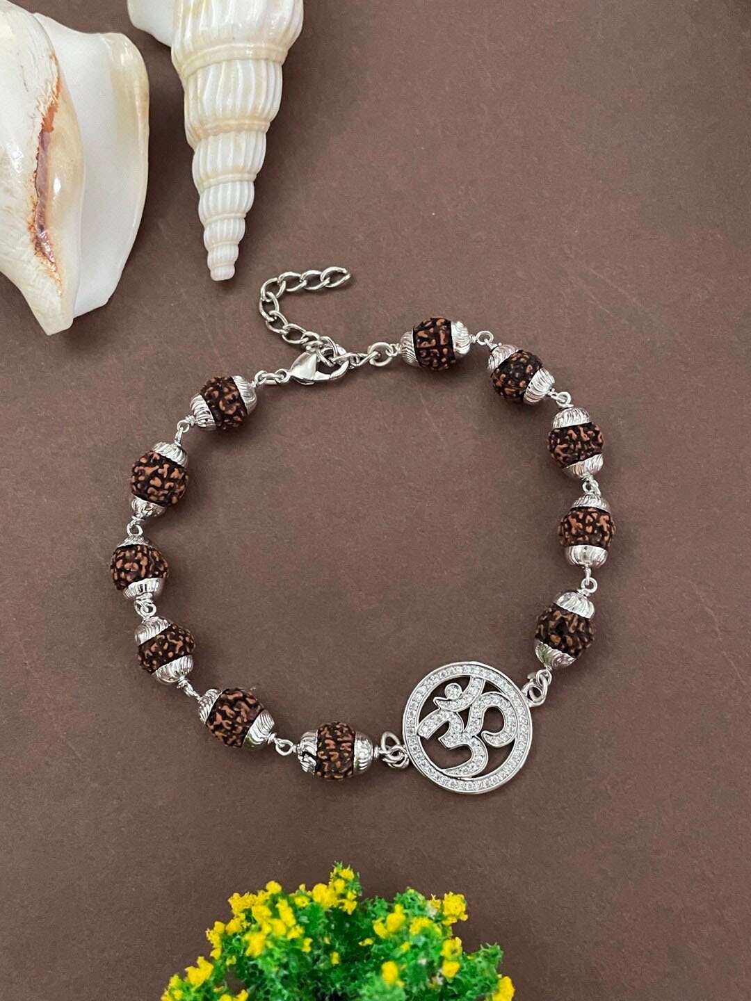 

Digital Dress Room Women Brass American Diamond Silver-Plated Charm Bracelet
