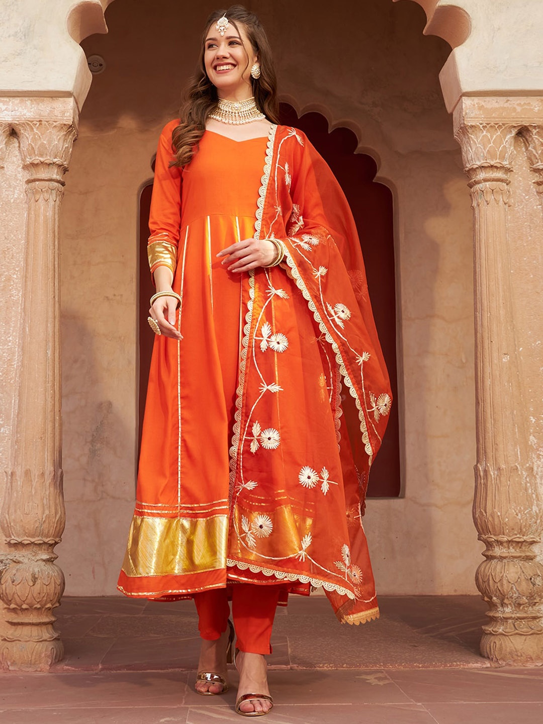 

Meeranshi Women Striped Regular Gotta Patti Kurta with Trousers & With Dupatta, Orange