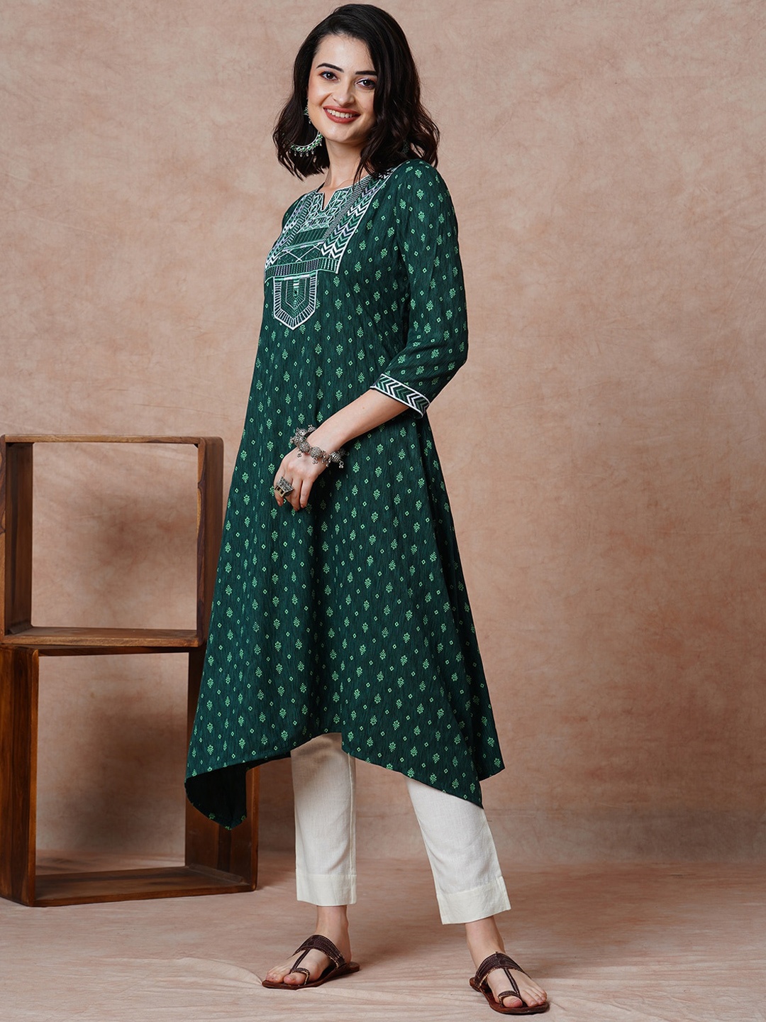 

Globus Green Ethnic Motifs Printed Round Neck Thread Work A-Line Kurta