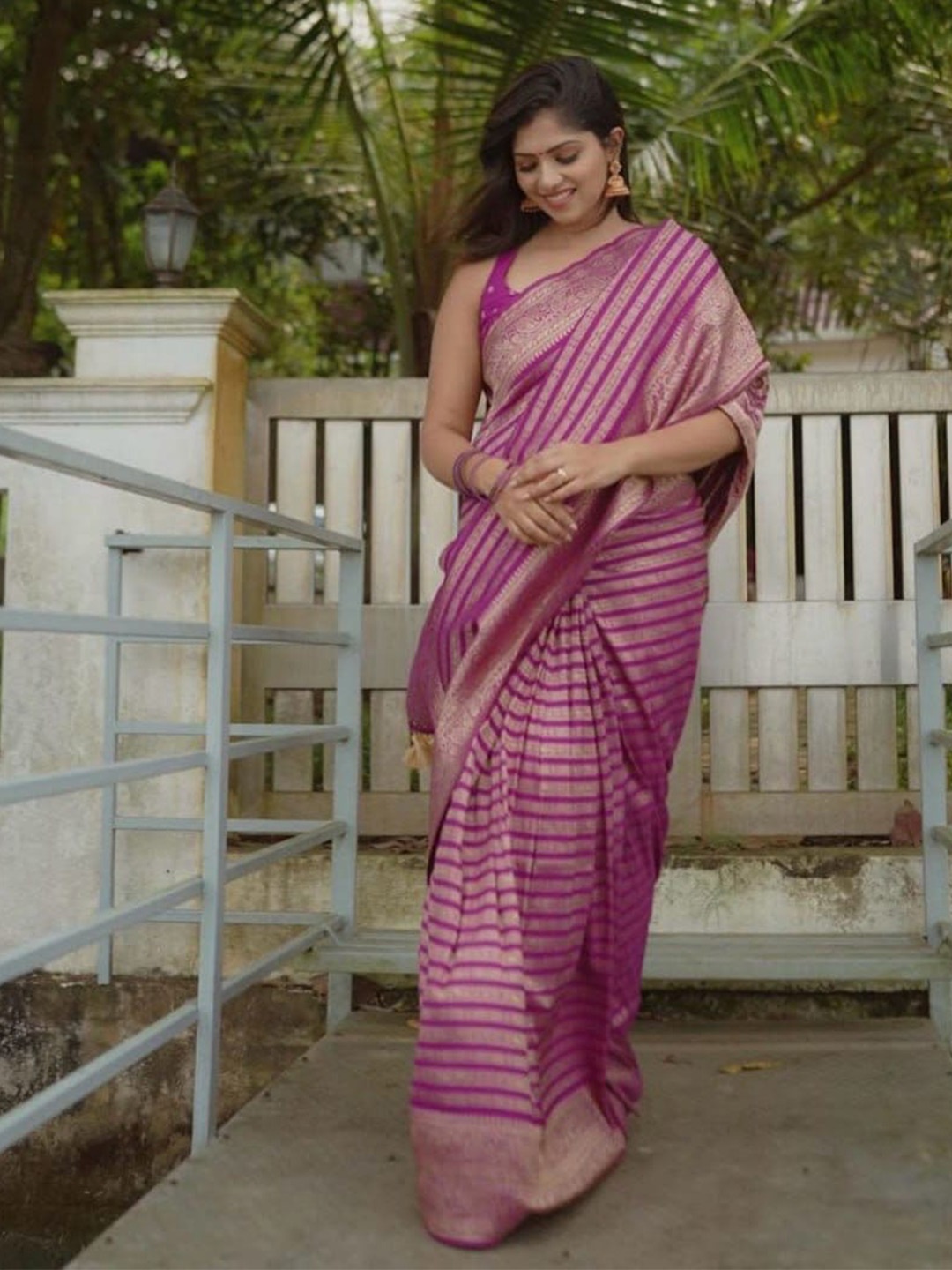 

Jinal & Jinal Striped Woven Design Zari Art Silk Banarasi Saree, Pink