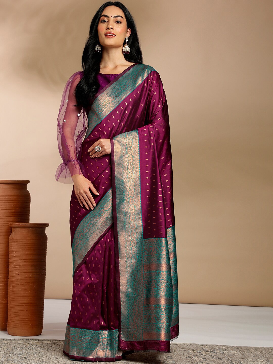 

Anouk Purple & Gold-Toned Ethnic Motifs Woven Design Zari Kanjeevaram Saree