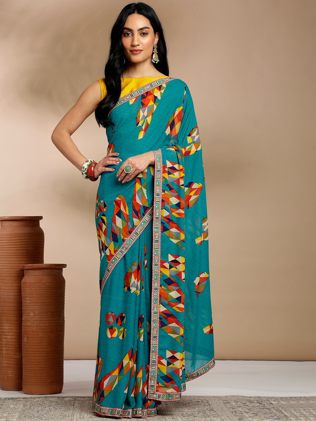 

Anouk Rustic Teal Green Geometric Printed Pure Georgette Saree