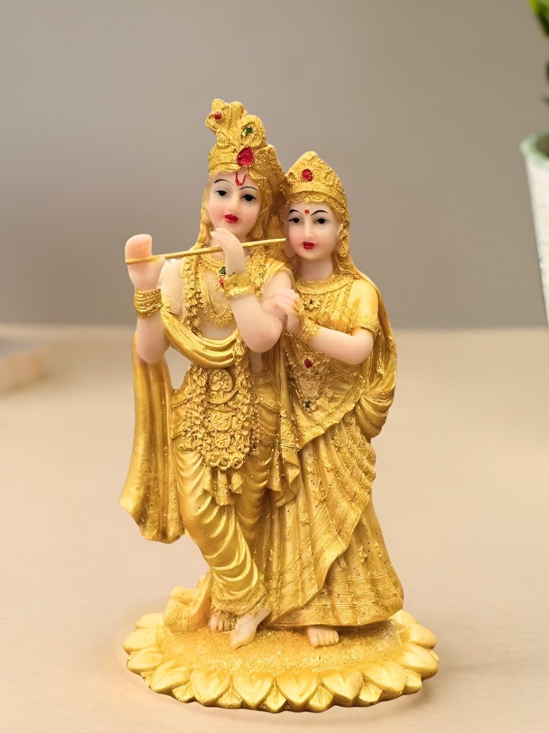 

Satyam Kraft Gold-Toned Religious Figurine Showpiece