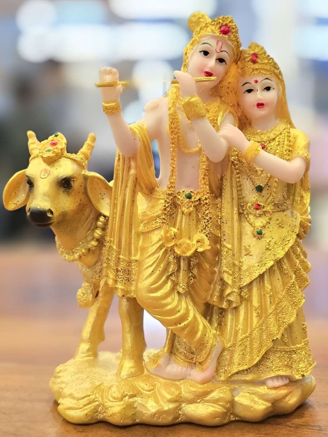 

Satyam Kraft Gold-Toned Religious Figurine Showpiece