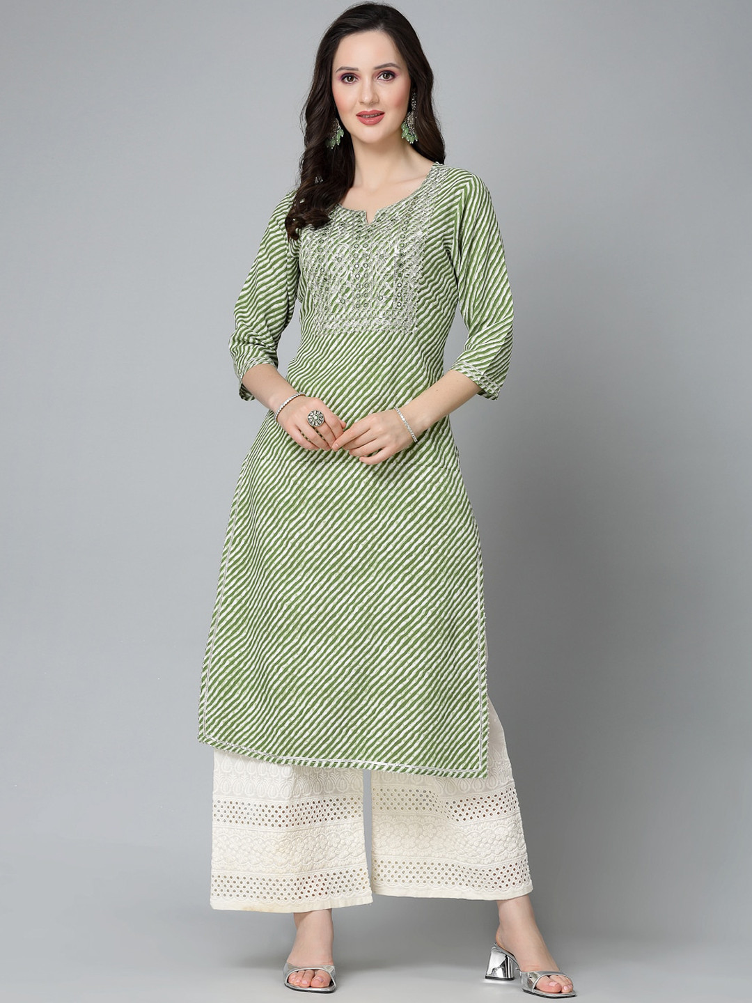 

Stylum Green Geometric Yoke Design Mirror Work Kurta