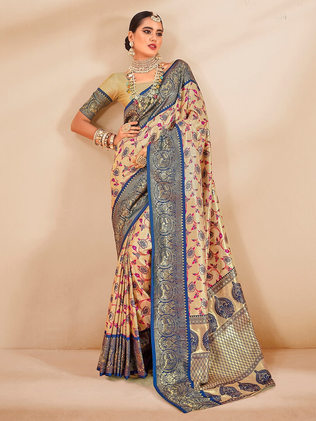 

Mitera Beige Ethnic Motifs Woven Design Zari Art Silk Banarasi Saree