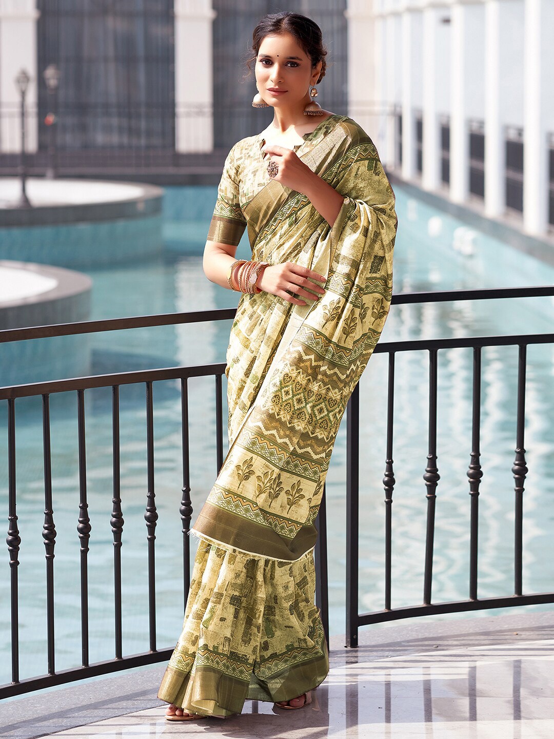 

Mitera Yellow Floral Printed Zari Art Silk Sungudi Saree