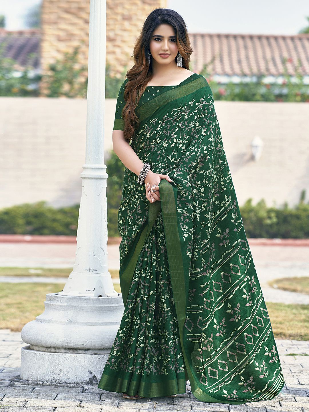 

Mitera Green Floral Printed Zari Art Silk Dabu Saree