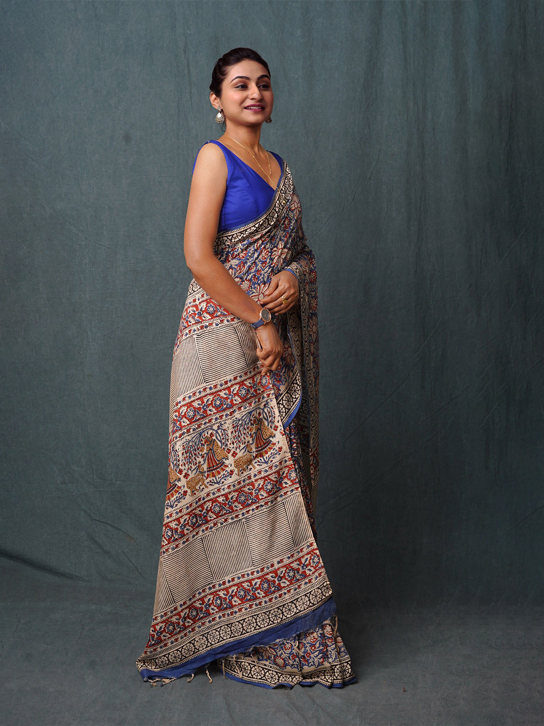 

Unnati Silks Ethnic Motifs Handloom Bagru Saree, Blue