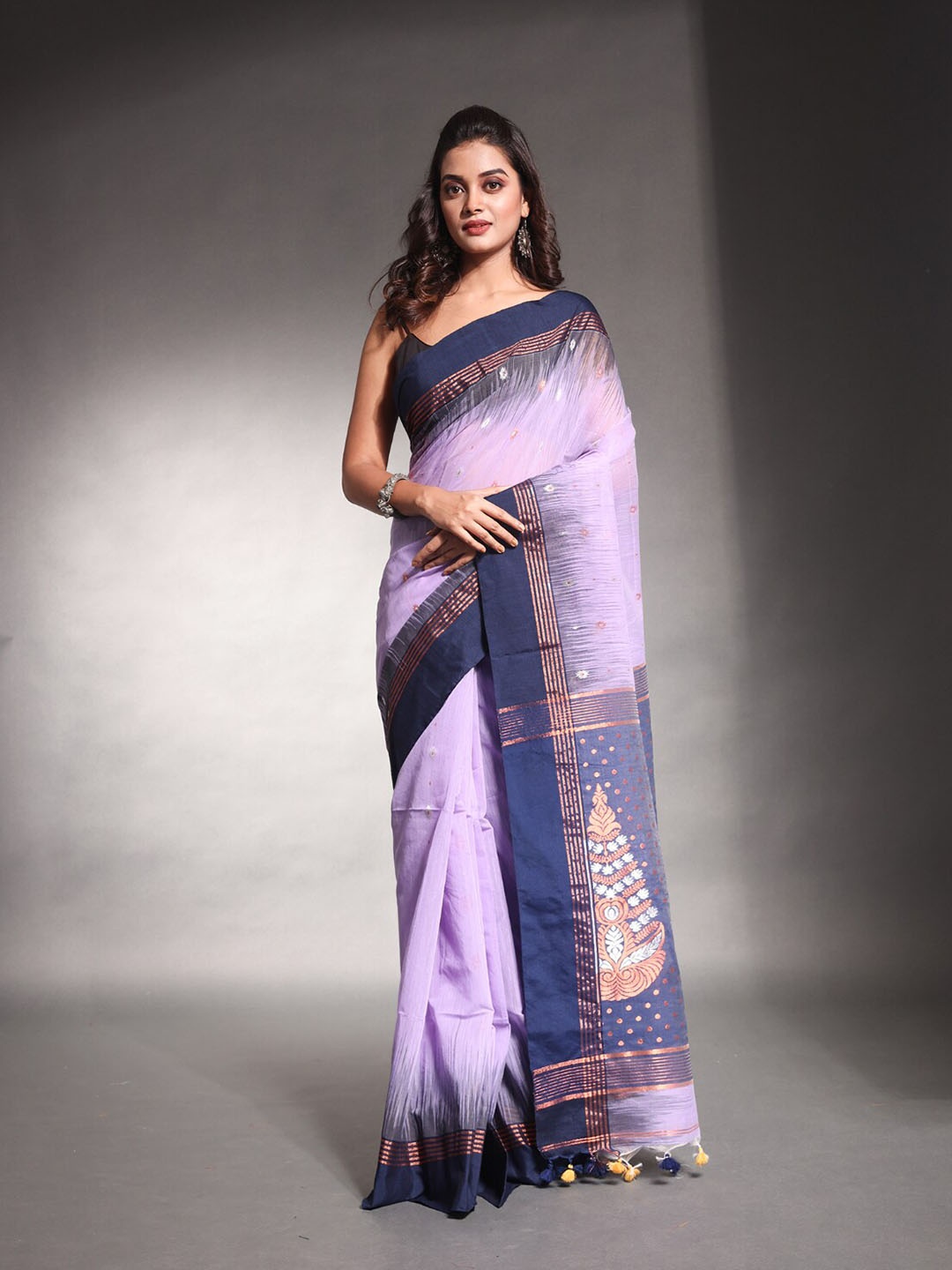 

Charukriti Ethnic Motifs Woven Design Zari Ikat Saree, Lavender