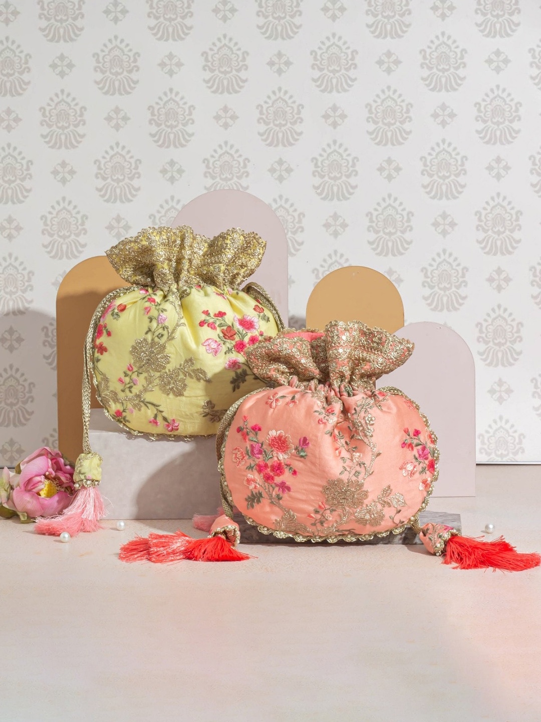 

AMYRA Embroidered Potli With Wrist Loop, Peach