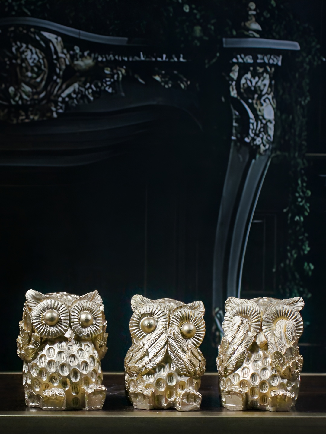 

THE WHITE INK DECOR Gold-Toned Figurine Showpiece