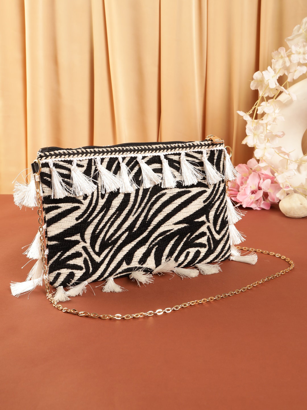 

DEEBACO Printed Structured Sling Bag, Black