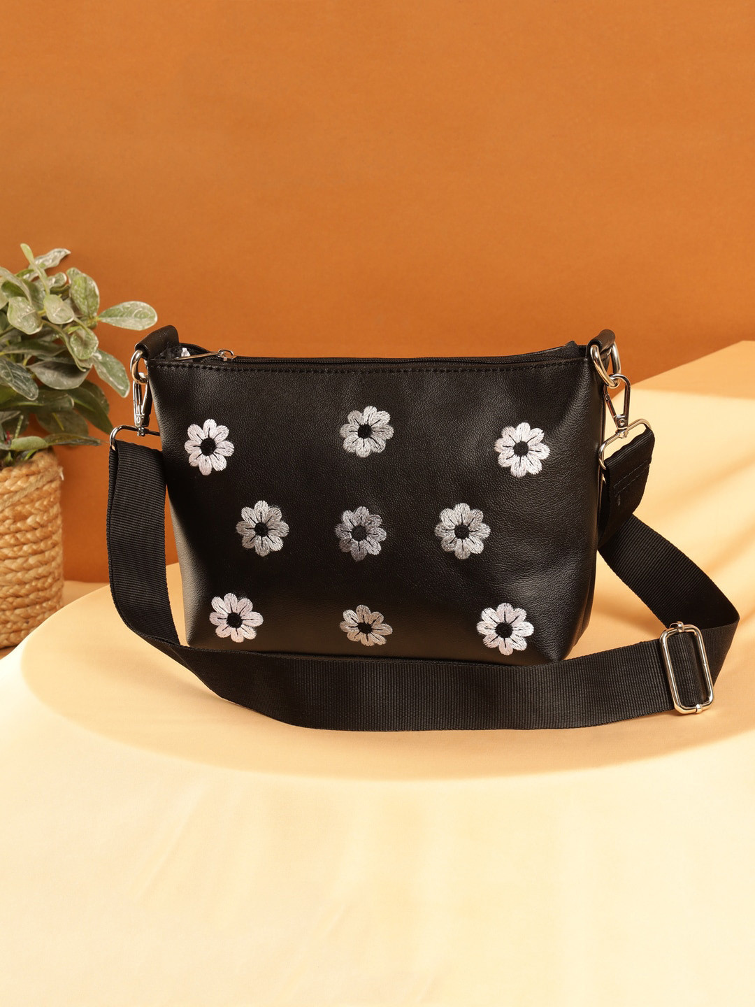 

DEEBACO Embroidered Structured Sling Bag, Black