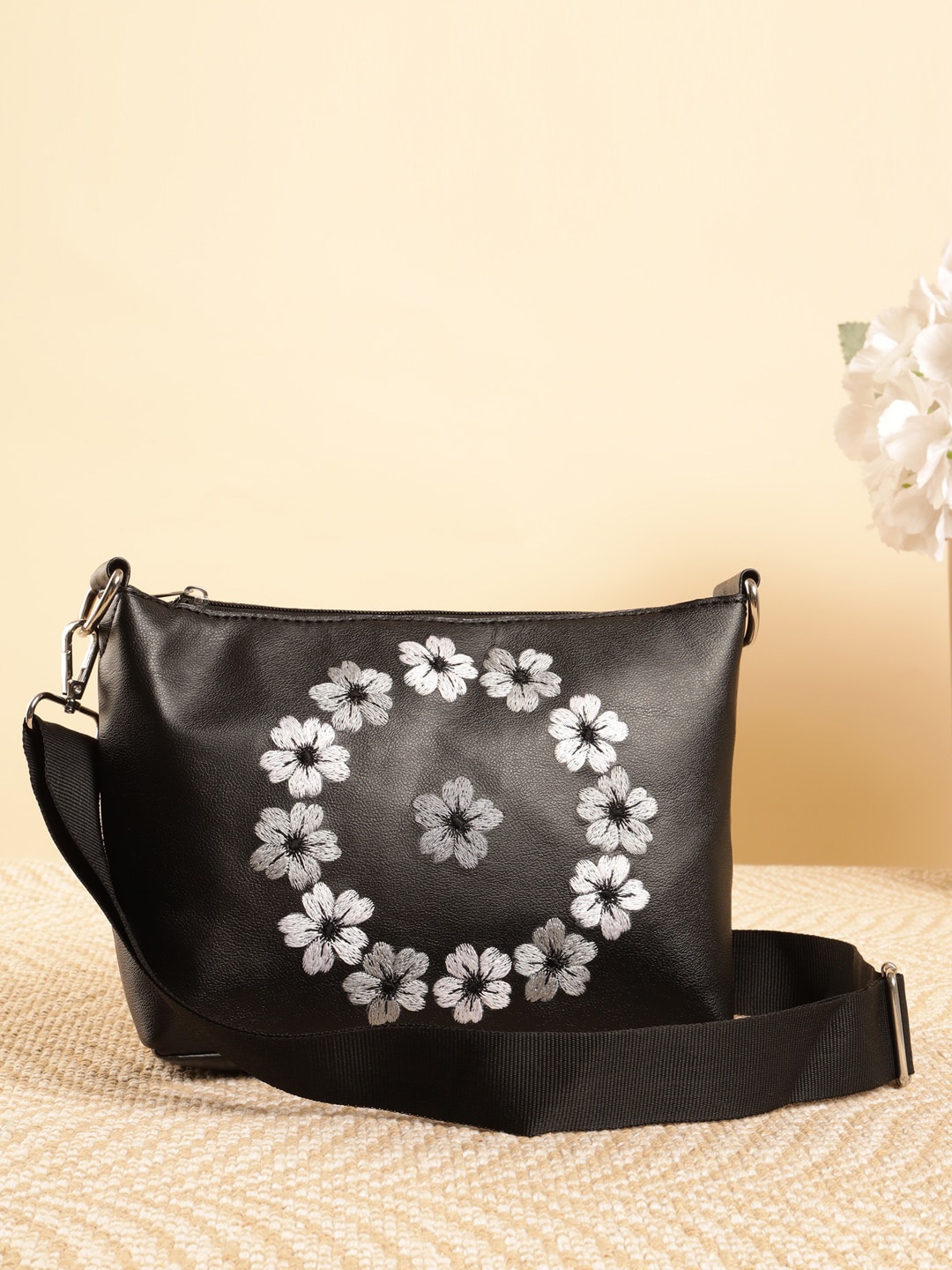 

DEEBACO Embroidered Structured Sling Bag, Black