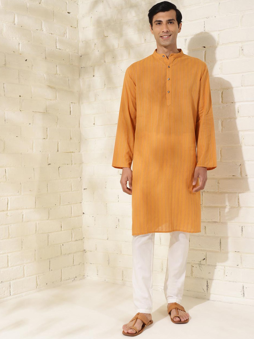

Fabindia Striped Mandarin Collar Cotton Straight Kurta, Mustard