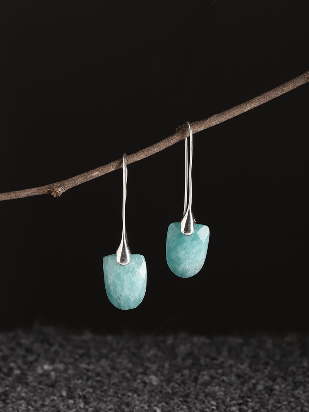 

Fabindia Silver Artificial Stones-Studded Teardrop Shaped Drop Earrings