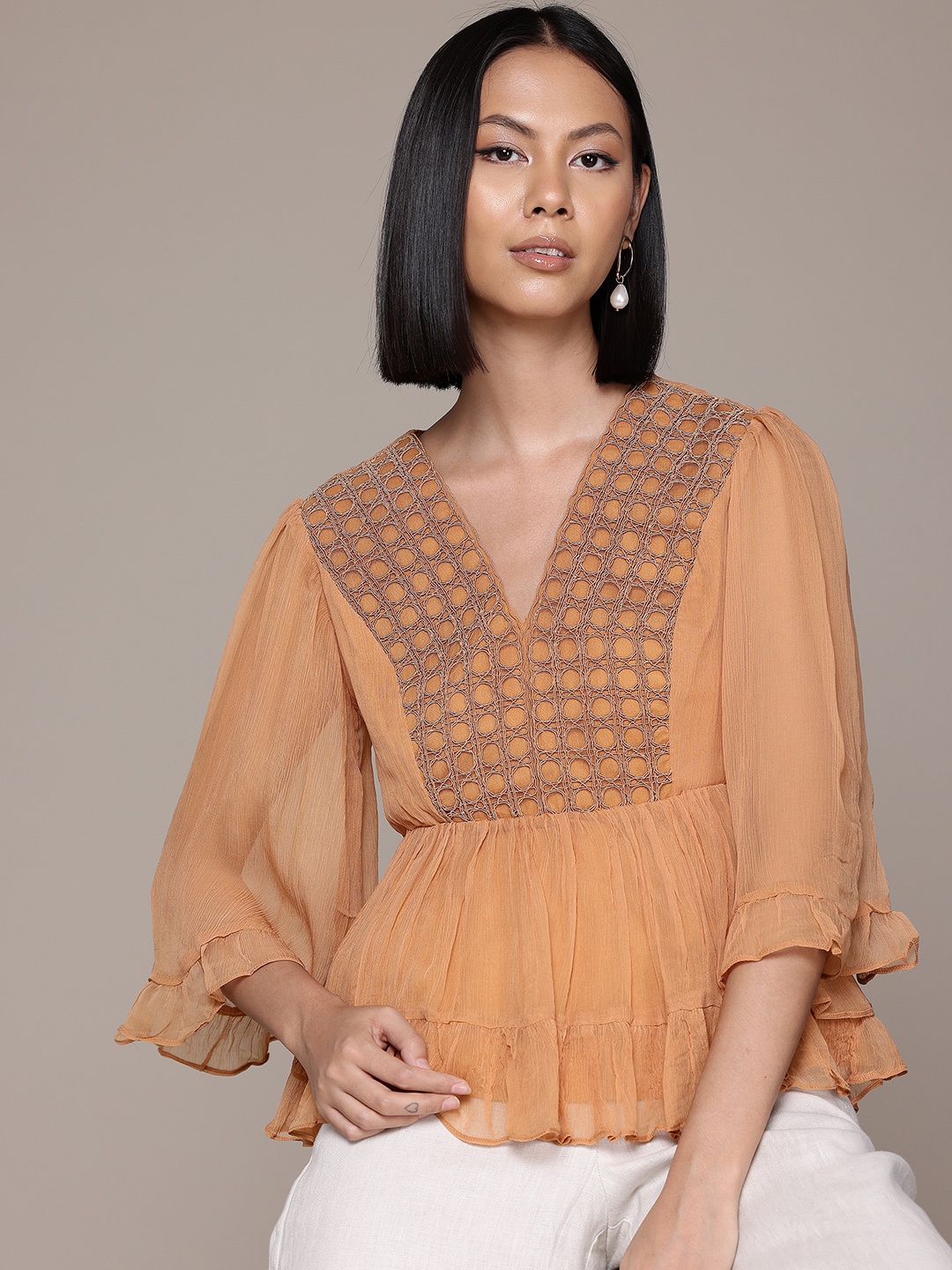 

Label Ritu Kumar Geometric Embroidered Flared Sleeves Chiffon Peplum Top, Copper