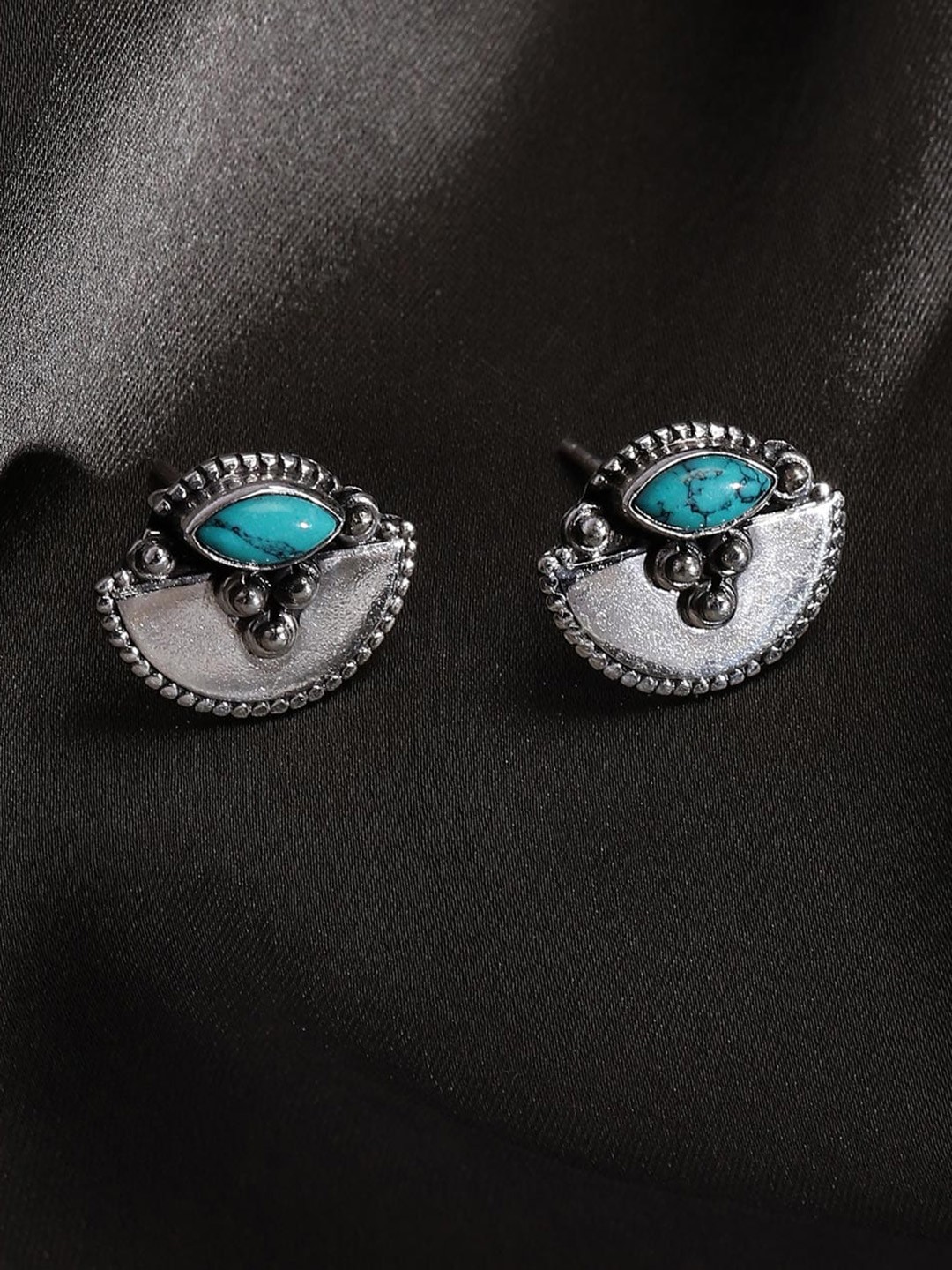 

Fabindia Crescent Shaped Silver Studs Earrings