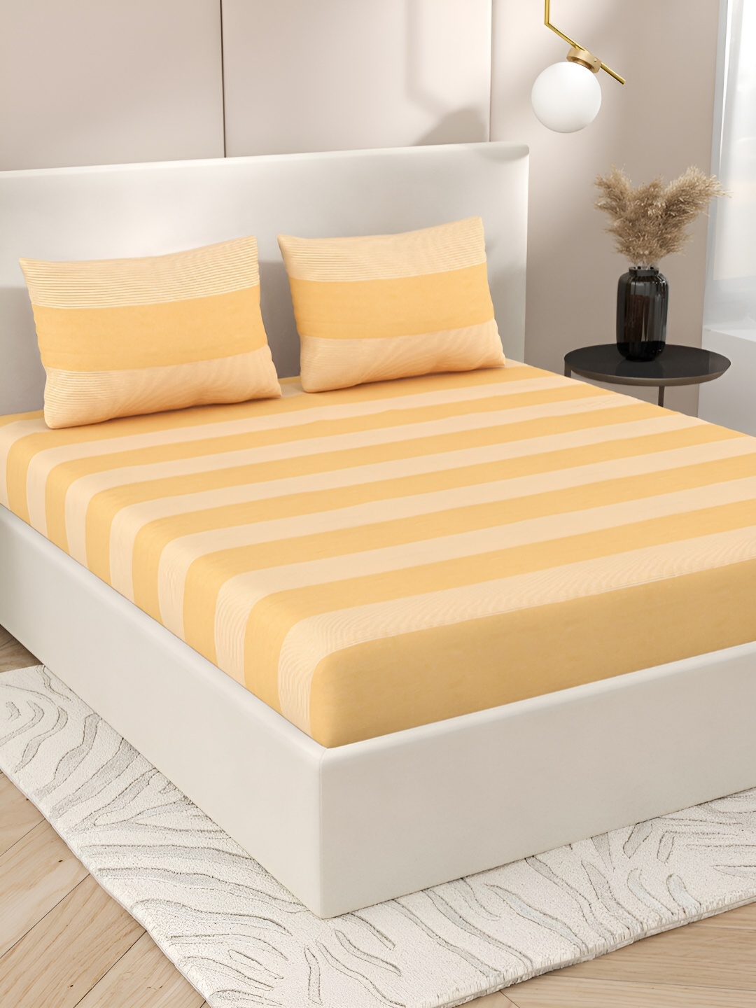 

Aura Yellow & White Striped 144 TC Cotton Queen Bedsheet with 2 Pillow Covers