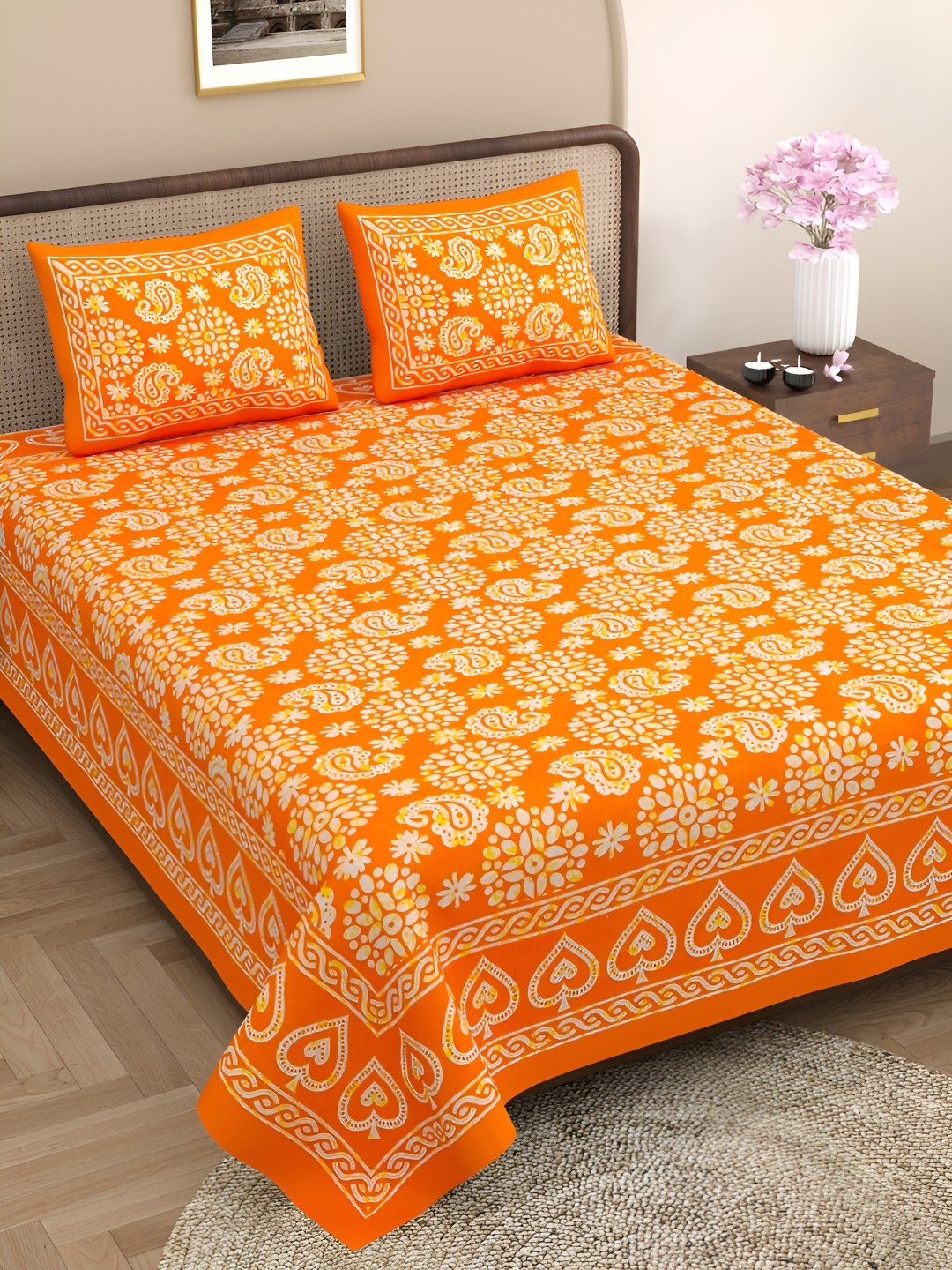 

Aura Orange & Yellow Ethnic Motifs 144 TC Cotton Queen Bedsheet with 2 Pillow Covers