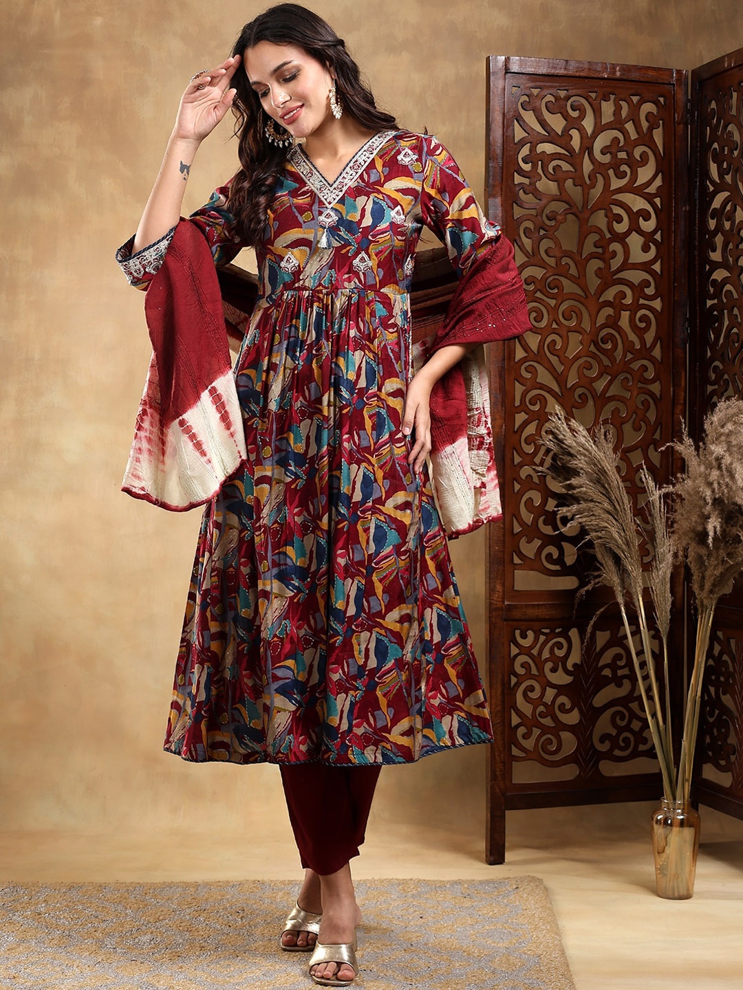 

Bani Women Floral Printed Anarkali Thread Work Kurta with Trousers & Dupatta, Burgundy