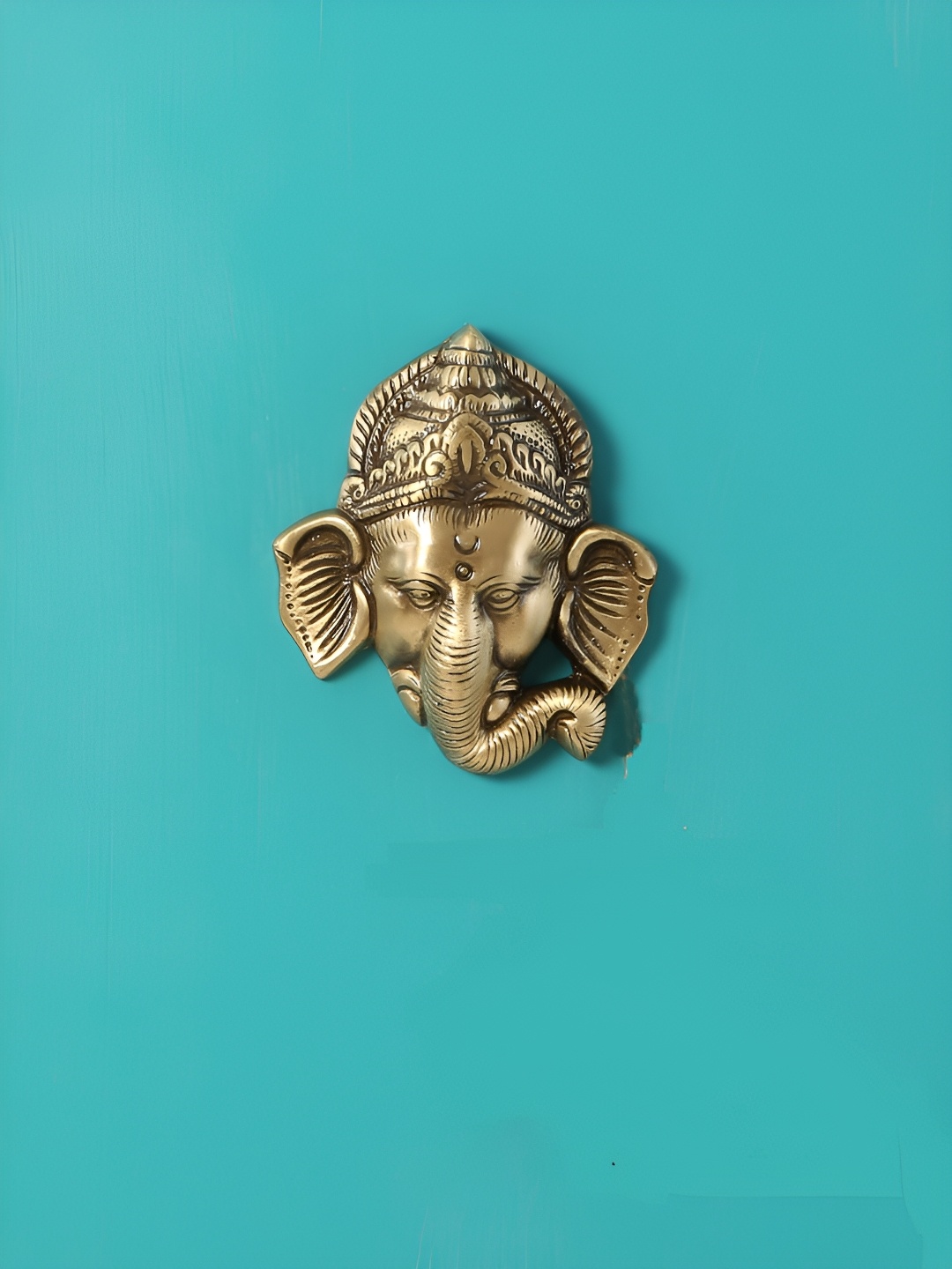 

Two Moustaches Brown Ganesha Mask Brass Wall Hanging