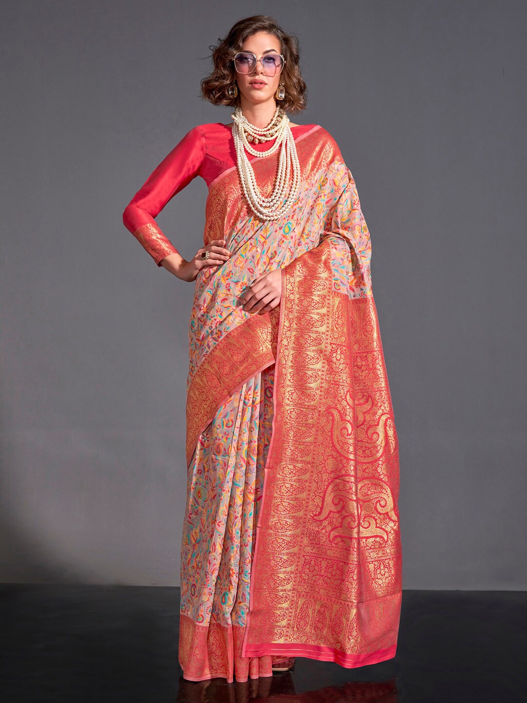 

Mitera Orange & Blue Ethnic Motifs Printed Zari Banarasi Saree