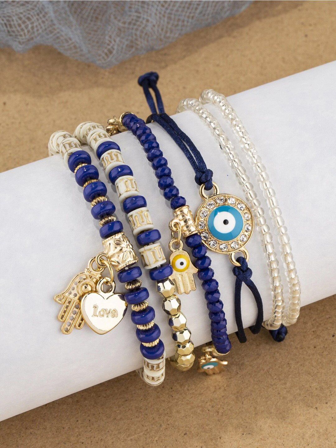 

YouBella Unisex Set of 6 Gold Plated Bohemian Evil Eye Elasticated Bracelets