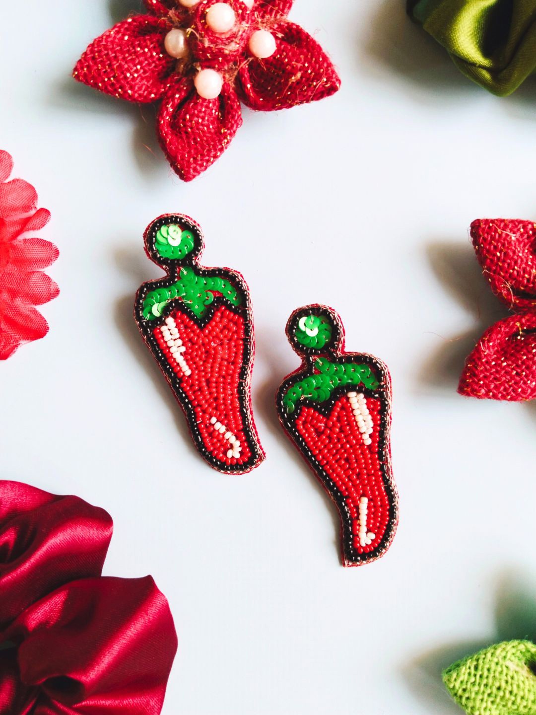 

DressBerry Red & Green Chilli Shaped Drop Earrings