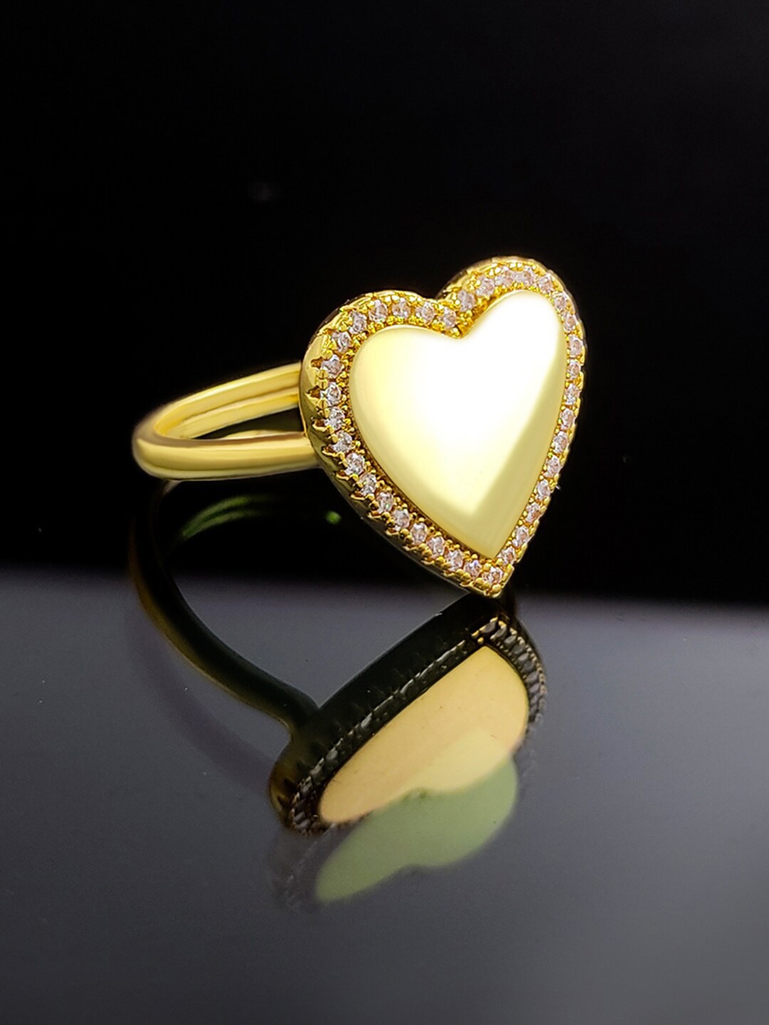 

Saizen Stainless Steel Gold-Plated American Diamond Studded Heart Shaped Finger Ring
