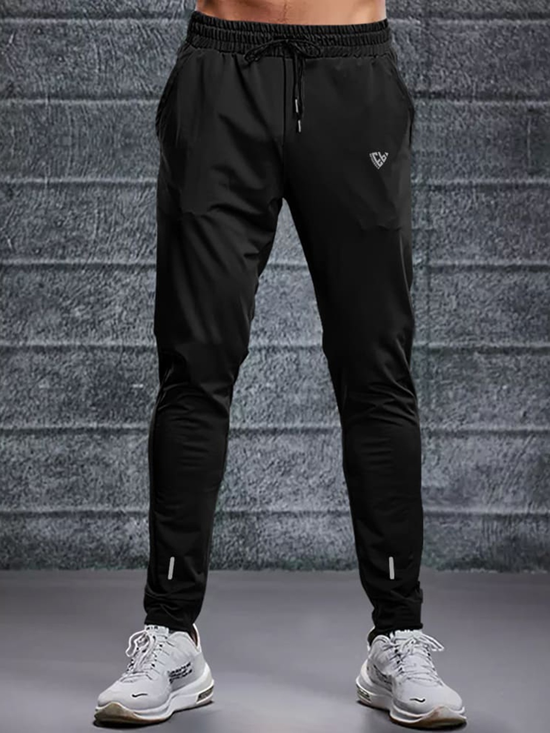 

Eyebogler Men Mid Rise Joggers, Black