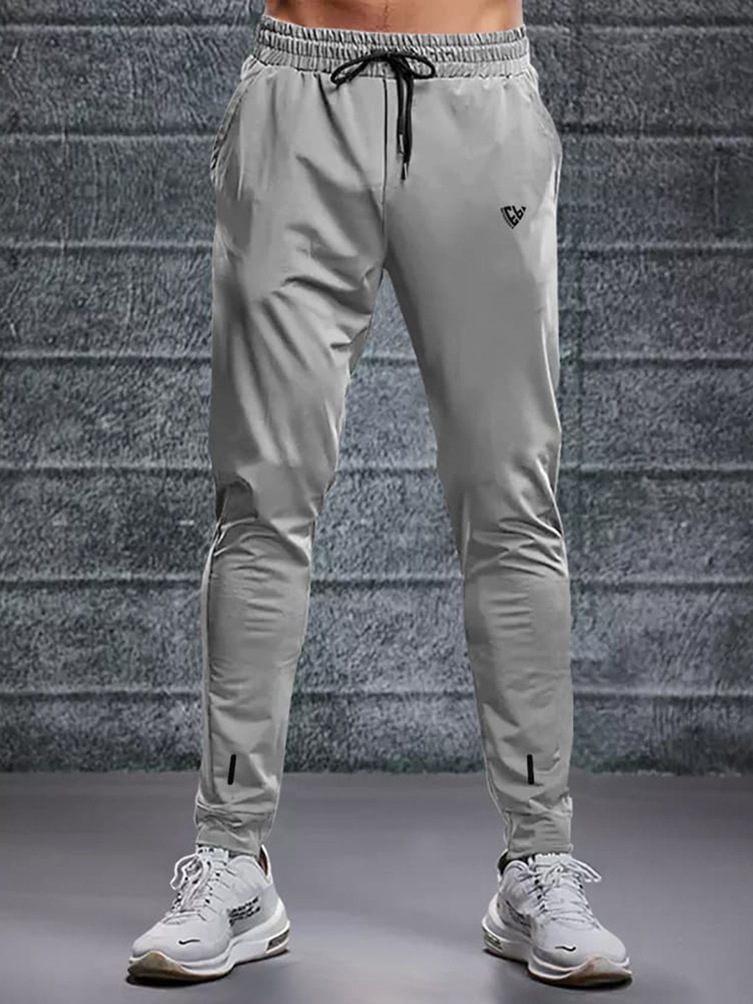 

Eyebogler Men Mid Rise Track Pants, Grey