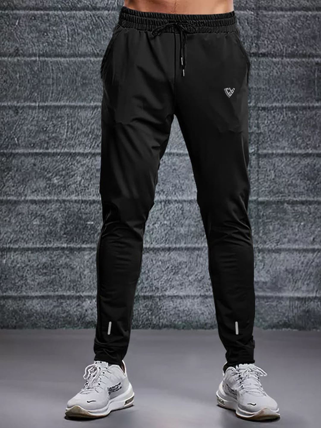 

Eyebogler Men Mid Rise Joggers, Black