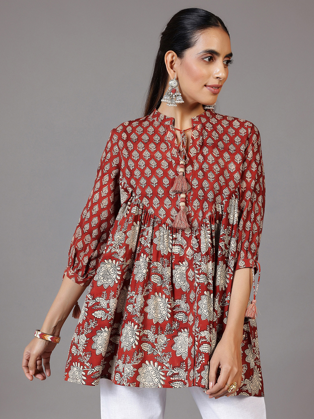 

Libas Floral Printed Tie-Up Neck Three-Quarter Sleeves Pure Cotton Pleated Kurti, Rust