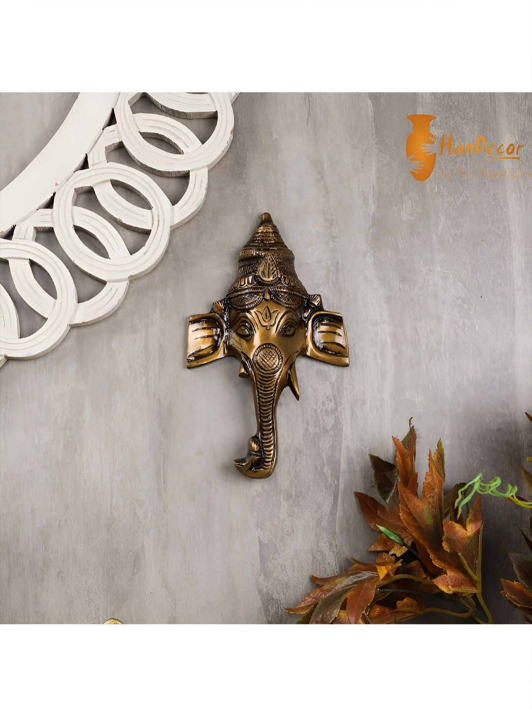 

Two Moustaches Brown Crown Ganesha Brass Wall Hanging