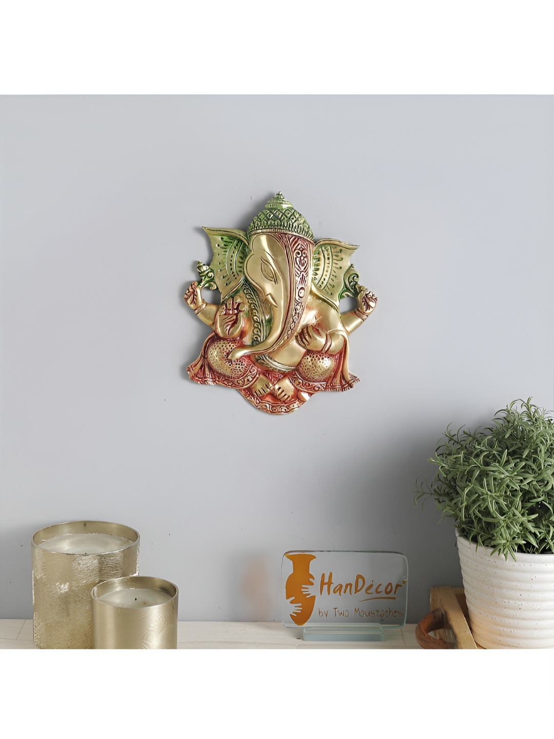 

Two Moustaches Green & Red Brass Ganesha Wall Hanging, Metallic