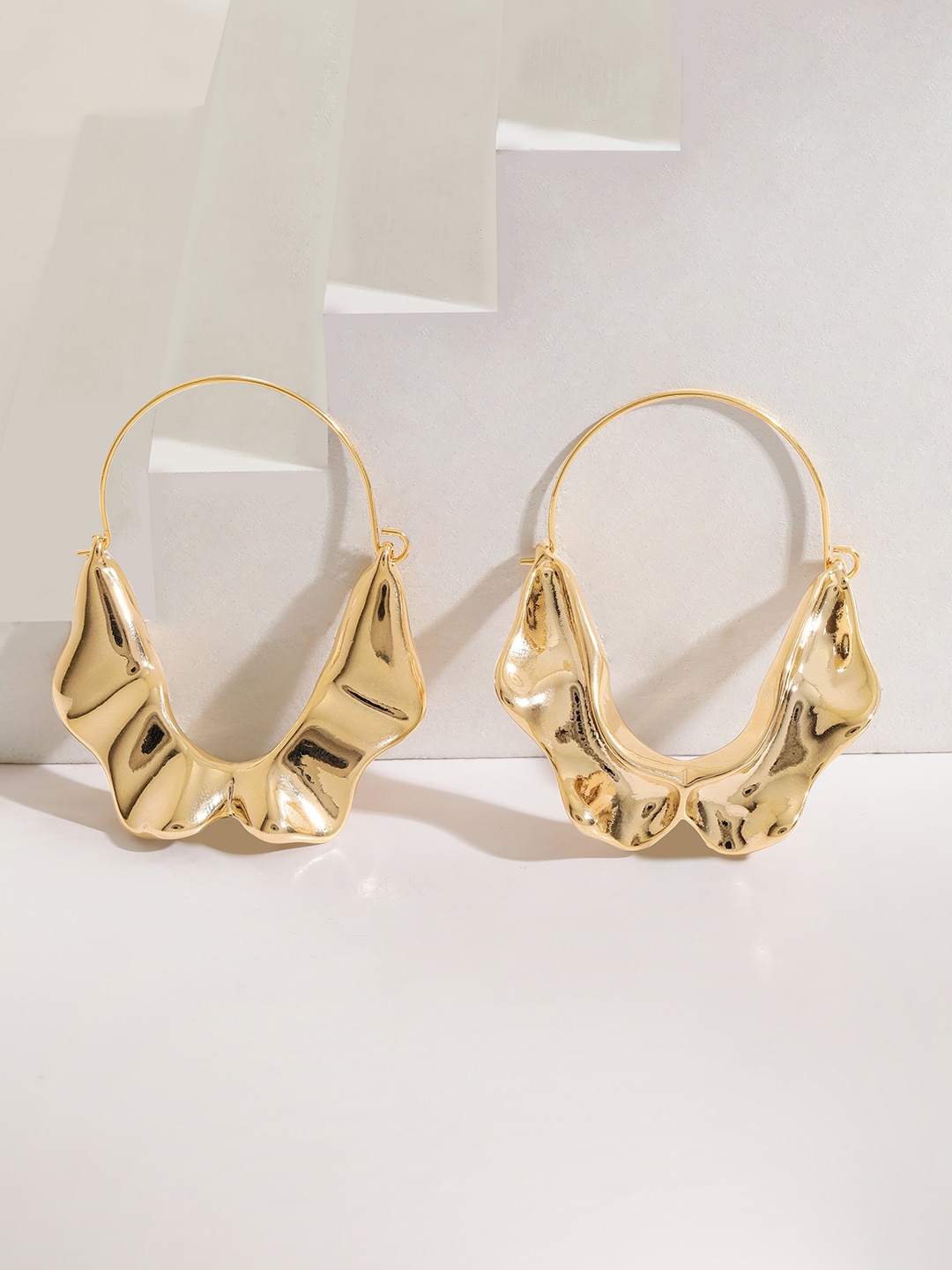 

Rubans Voguish 18KT Gold Plated Stainless Steel Twist-On Oval Huggies Hoops