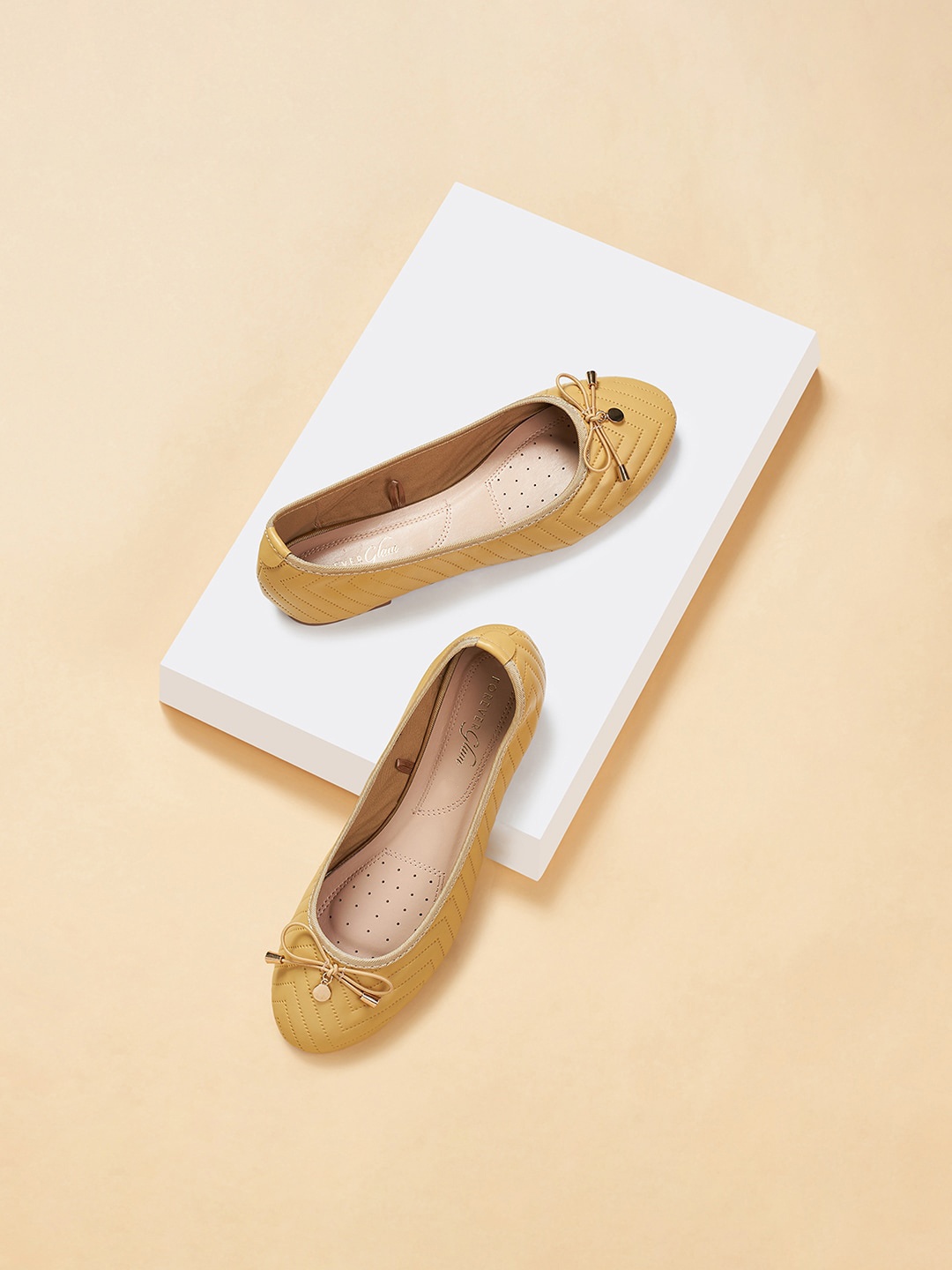 

Forever Glam by Pantaloons Textured Round Toe Bows Ballerinas, Yellow