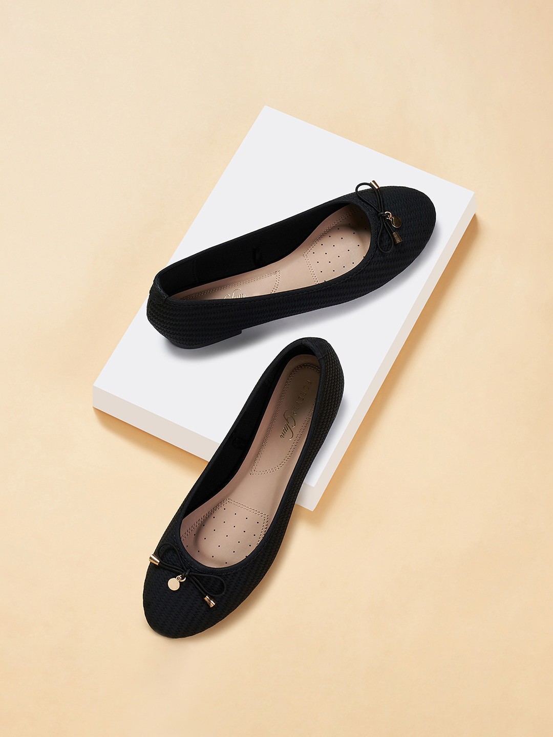 

Forever Glam by Pantaloons Textured Round Toe Bows Ballerinas, Black