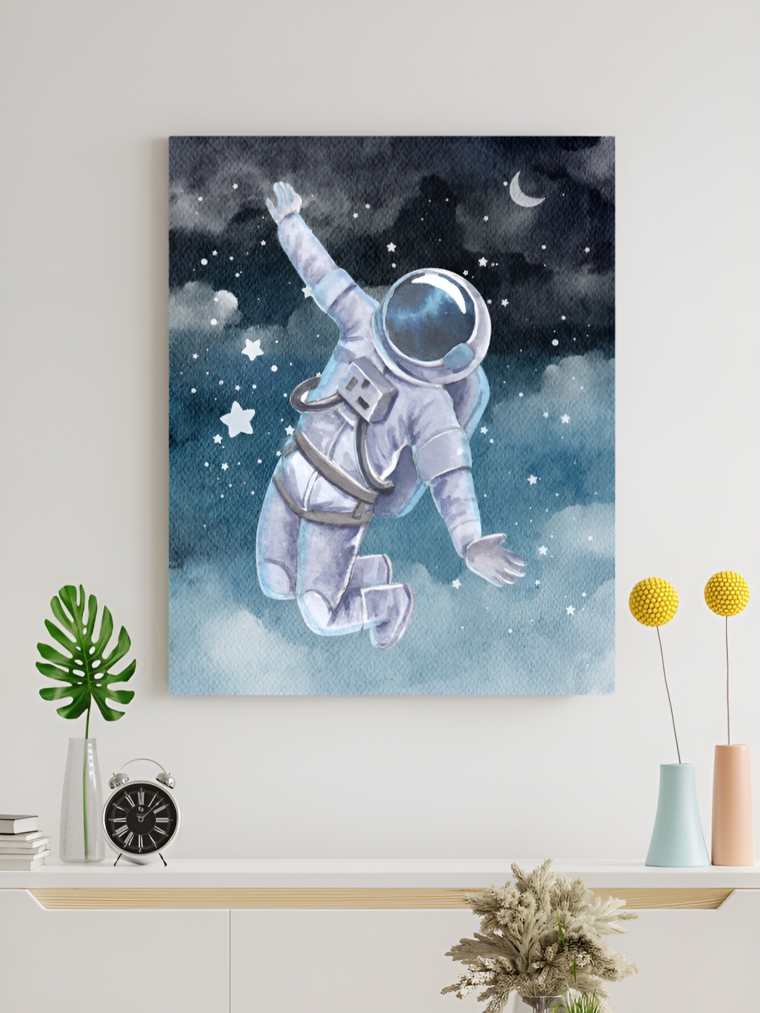 

The Decor Lane Blue & Black Astronaut In Space Printed Canvas Wall Art