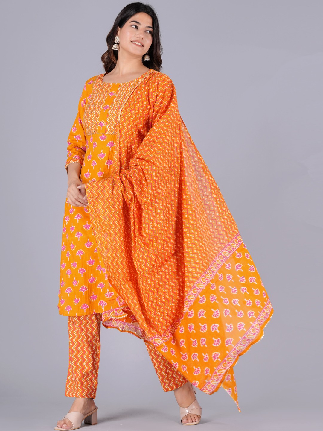

KALINI Floral Printed Gotta Patti Regular Kurta With Trousers & Dupatta, Orange
