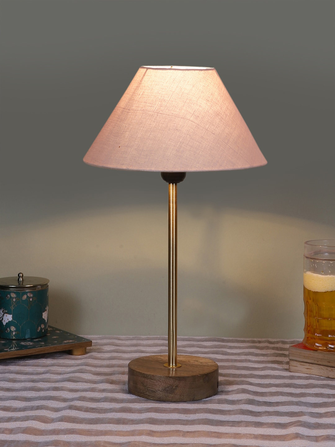 

Devansh Unisex Grey Textured Wooden Contemporary Table Lamp