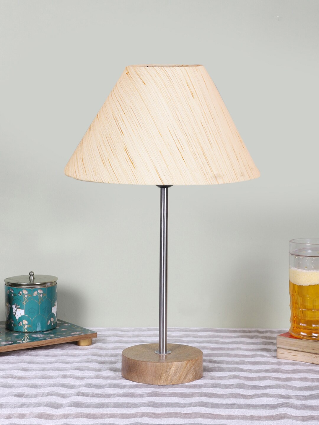 

Devansh Off White Textured Cotton Frustum Table Lamp